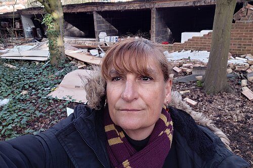Cllr Athena Zissimos at the site of the collapsed wall in Hanger Hill ward.