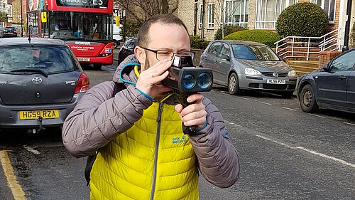 Cllr Gary Malcolm conducting speed checks on The Avenue.