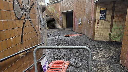 A muddy subway crossing at Hanger Lane Gyratory.
